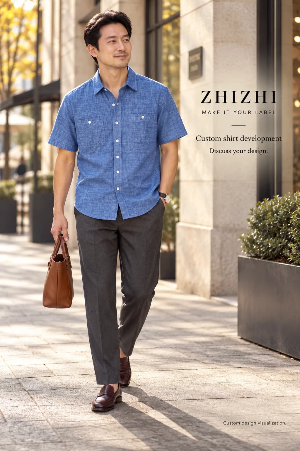 Custom mens blue short sleeve no flap button pocket chambray shirt concept — street-front — original design concept